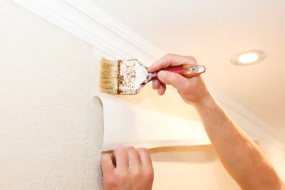 Pose de papier peint à Saint-Ours — revêtements muraux et toiles de verre